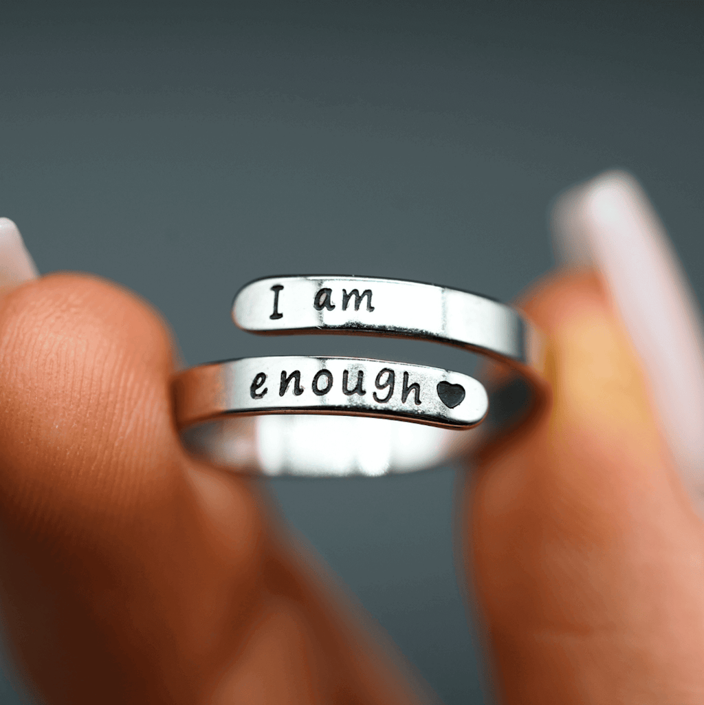 I Am Enough Ring showcasing a stylish design for anxiety relief and motivation in daily life.
