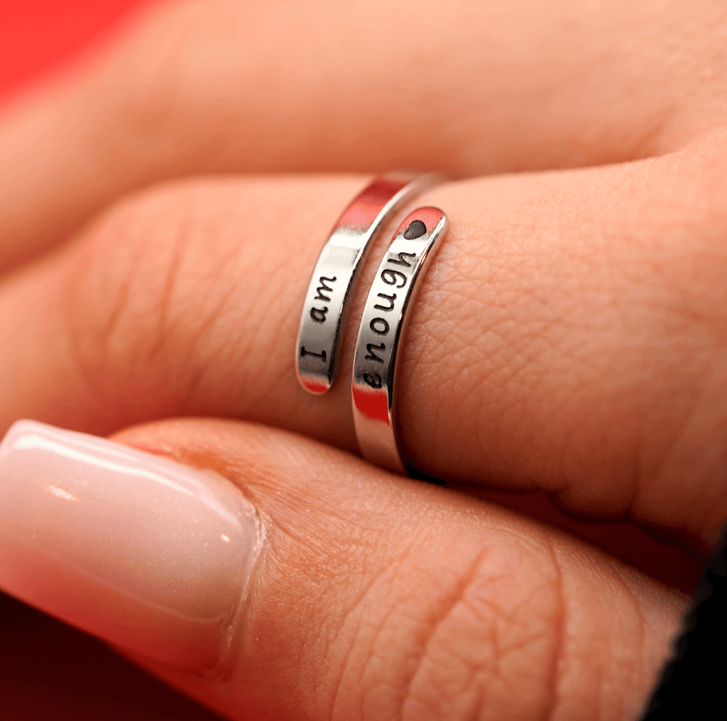 I Am Enough Ring designed for anxiety relief and motivation, featuring the uplifting message 'I am enough'.